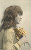 Image 2 - girl right profile, holds flowers to chest, looks & faces right