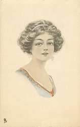 girl with brown hair wearing blue dress with orange trim faces right & looks front
