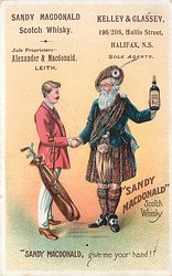 "SANDY MACDONALD" GIVE ME YOUR HAND! man in traditional dress holds up bottle whilst shaking hands with man holding golf bag