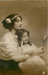 girl and mother look at sparkly object