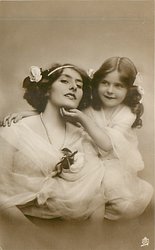 girl touches mothers chin