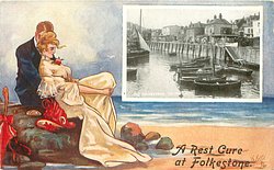 OLD FOLKESTONE. THE HARBOUR couple sit close on rocks, she wears a white dress with red hat & parasol, looks right