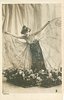 Image 3 - PETIT woman in gown with huge wings, flowers in front of her