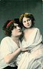 Image 1 - mother and child, child has one arm behind mother, both look right & up