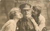 Image 1 - soldier between two girls, both girls look toward soldier, soldier faces forward