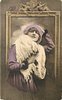 Image 2 - pretty girl with ermine fur & cap posed in front of framed mirror, she faces front looks up, her left hand on head, her right hand on fur in front of her