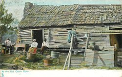 AT THE OLD CABIN DOOR