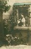 Image 1 - QUAND LE JOUR POINT JE ME METS A LA FENETRE POUR APERCEVOIR DE LOIN LE BIEN AIME Marguerite stands looking out a window