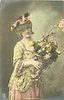 Image 1 - girl faces right looks back left over her shoulder, floral basket right