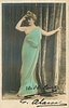 Image 1 - LABADY woman standing faces front, looks half left, her right hand touches hair, left hand points right
