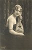 Image 1 - pretty girl with long hair in off shoulder dress faces right with mandolin held vertically on her lap, looks front