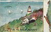 Image 7 - couple lie on grassy cliff, lighthouse behind