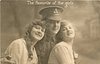 Image 1 - soldier between two girls, all three face right, looking forward