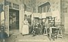 Image 1 - MME.REJANE DANS MME. SANS-GENE man seated dressed for out-doors, girl stands left in kitchen with washing hanging