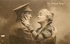 Image 1 - soldier in uniform to left embraces mother to right, her left hand on his cheek, his right hand on her shoulder