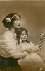 Image 1 - girl and mother look at sparkly object