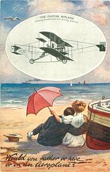 inset THE CURTISS BIPLANE SHOWING FORWARD AND REAR DRIVING PLANES couple sit close on sands next to a row boat, she wears a white dress, has red parasol, they look out to sea