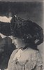 Image 1 - MISS GRACE LANE, head bowed, facing left and looking down
