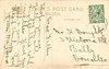 Image 2 - uniformed postlady delivering letters, faces left, looks down, opens satchel with her left hand, another letter in her right hand