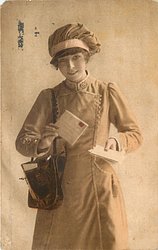 uniformed postlady delivering letters, faces and looks center, holds letter in right hand, holds stack of letters in left hand