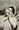 Image 1 - MISS LILY HANBURY hands both at her face, facing front, looking left/up,shawl over hair