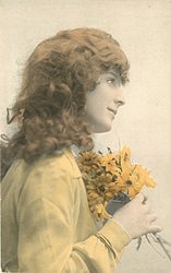 girl right profile, holds flowers to chest, looks & faces right