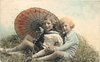 Image 1 - two boys play in straw, looking forward, parasol behind, handle to left of boy on left