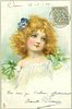Image 1 - head & shoulder study of golden-haired girl with pansies in her hair, green bows on both shoulders of white dress
