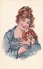 Image 1 - Woman in blue shirt holding dog, dog is on her left