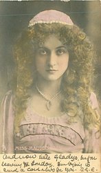 MISS MAUDE FEALY beaded embroidered on front of dress, pearls and little cap, hair in curls