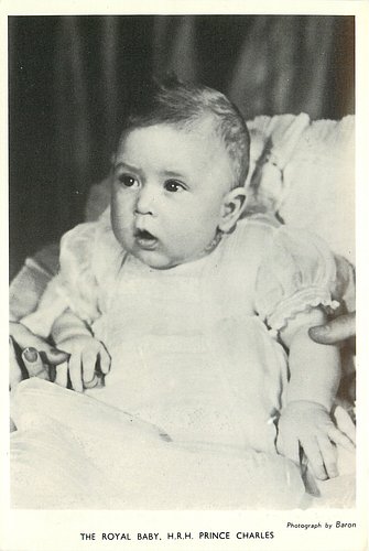 The Royal Baby, H.r.h. Prince Charles Baby Sitting In Seat With Mouth 